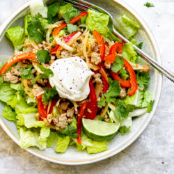 Onion and Turkey Lime Taco Salad on white background